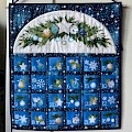 Quilted Advent calendar made with pre-printed fabric.