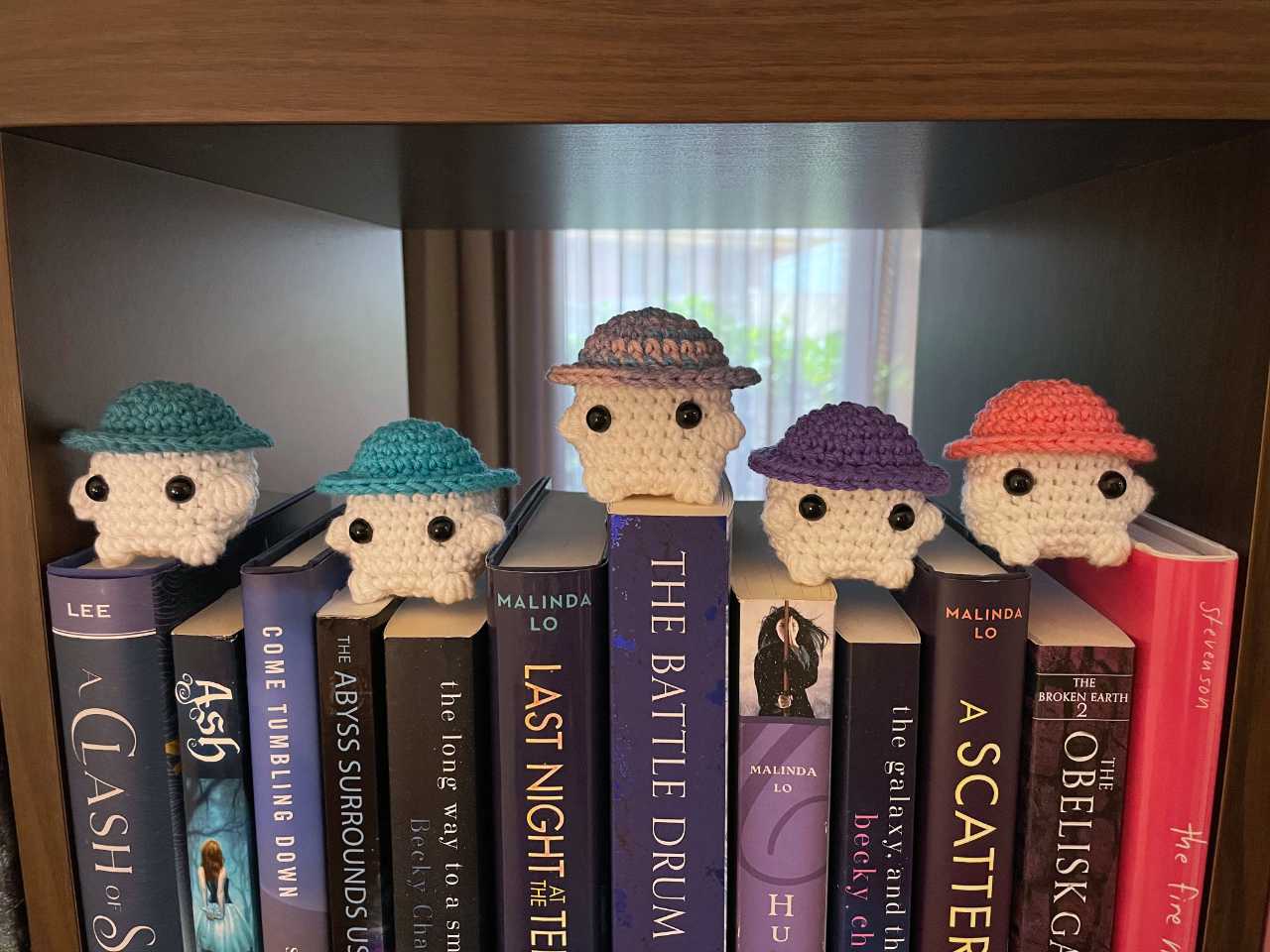 The second half of my mushroom amigurumi rainbow, on top of my book rainbow